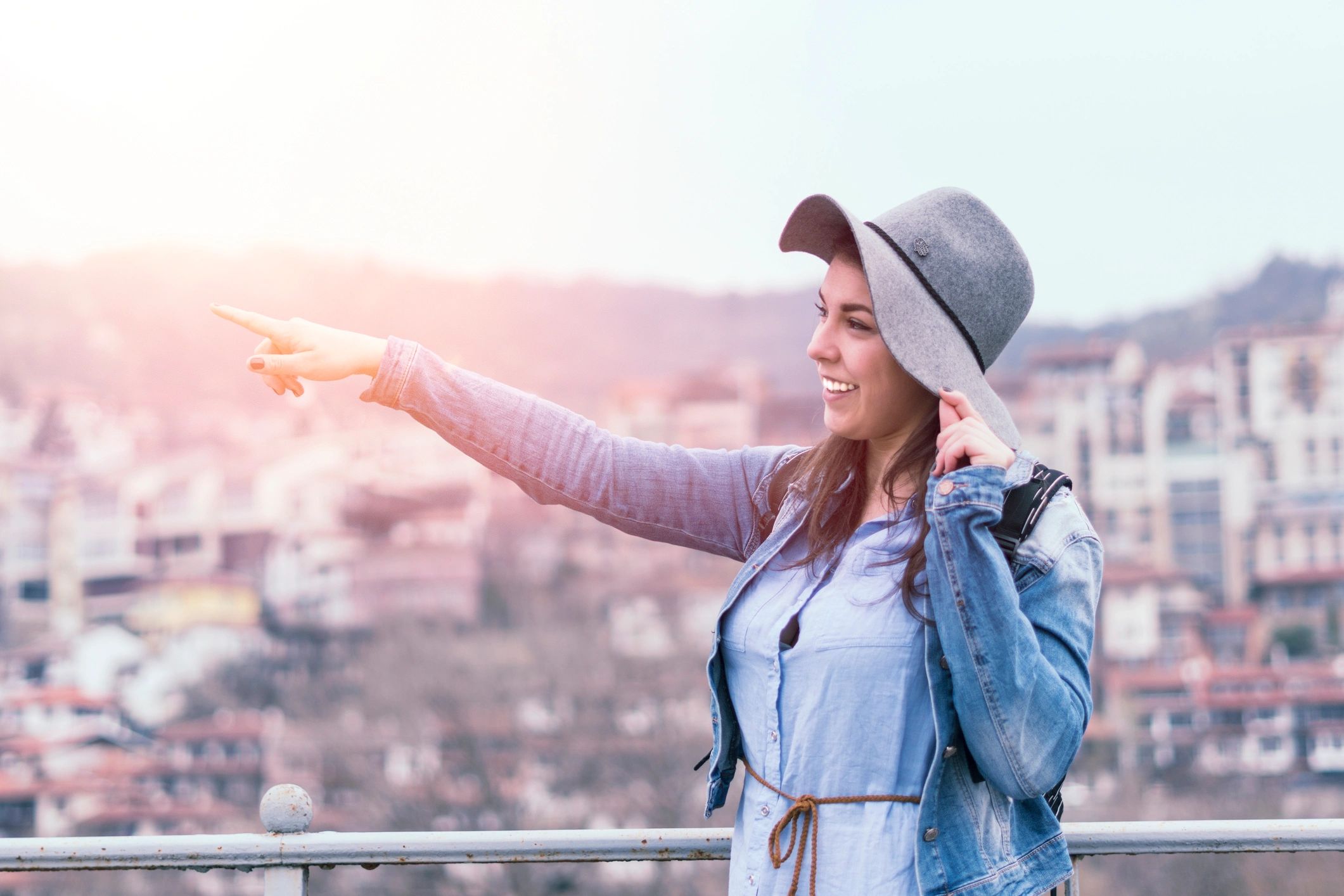 Solo traveler enjoying a city destination at sunset